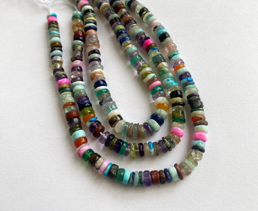 Vibrant, smooth wheel-shaped beads showcasing refined shine and sleek texture.