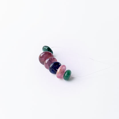 Authentic multi‑gemstone rondelle beads highlighting vibrant hues and premium bead quality.