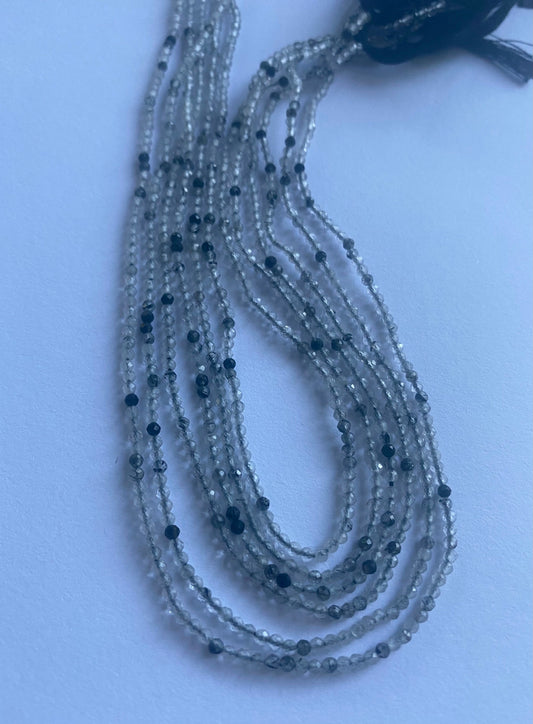 Stunning strand with 2mm Black Rutile micro faceted rondelle beads, ideal for a stylish accessory.