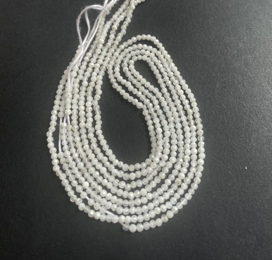 A striking strand of natural moonstone beads, with 2.1mm white faceted rondelles, perfect for adding colour to creations.