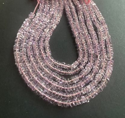 Elegant strand adorned with smooth wheel amethyst stones, showcasing a rich pink colour.
