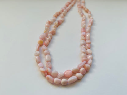 Stunning  4-5.5mm smooth opal  gemstone beads, reflecting the unique charm of opals.