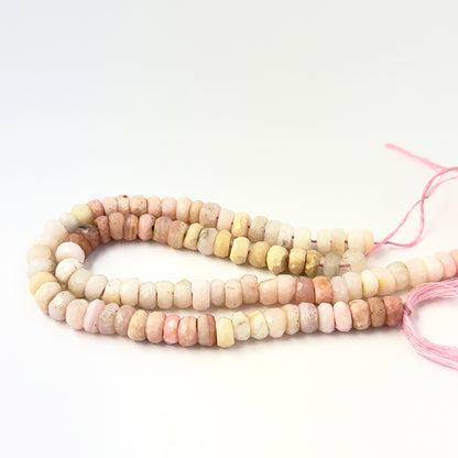 Authentic Pink Shaded Opal faceted rondelle beads with natural colour variation, ideal gemstone beads for professional jewellery.