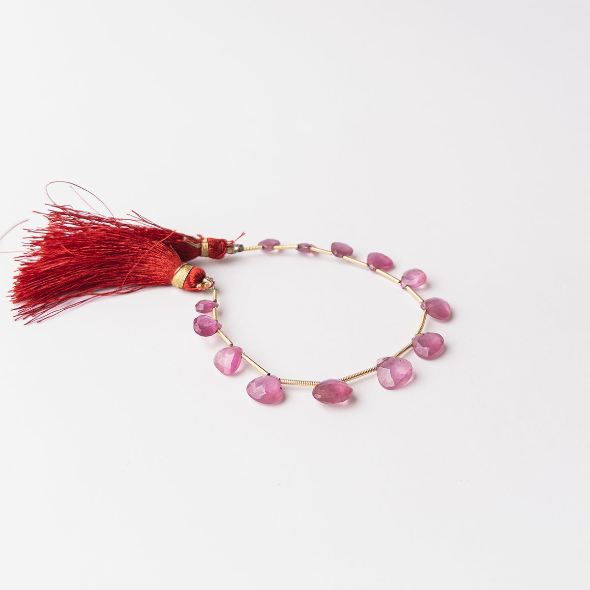 Authentic Ruby stone beads featuring elegant faceted briolette cuts for luxury handmade jewellery designs.