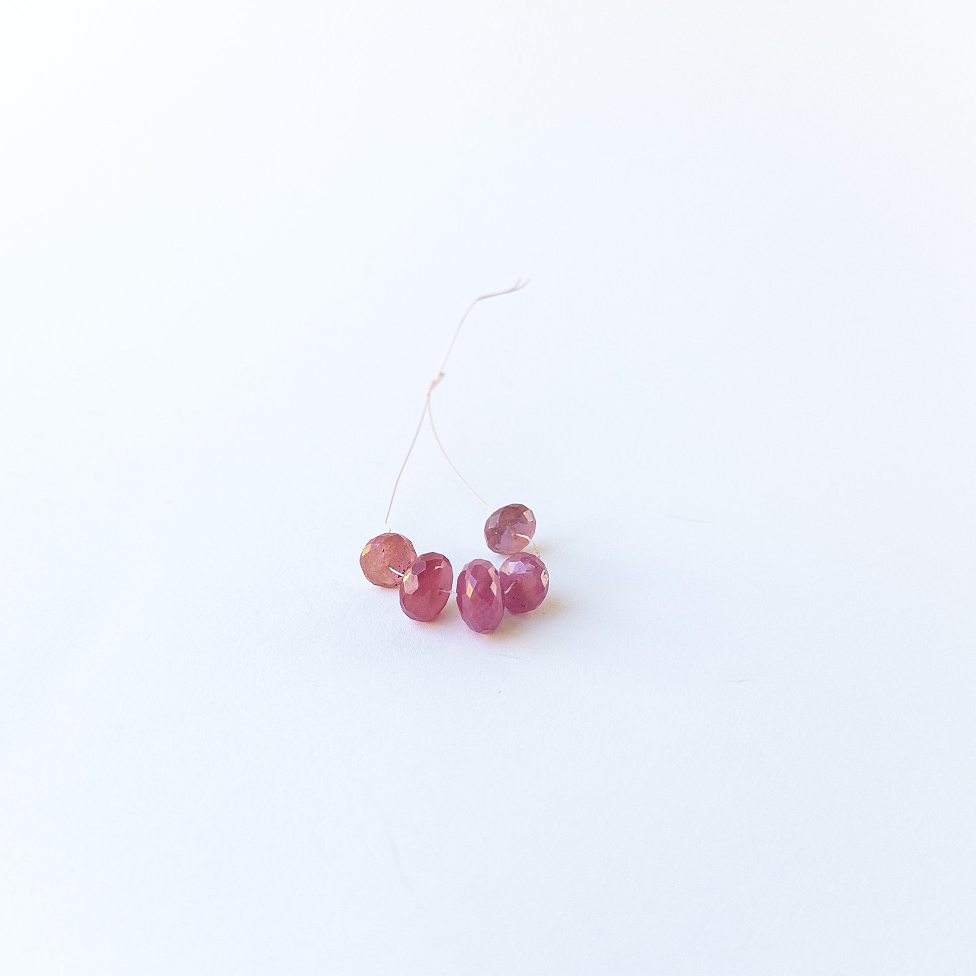 High‑quality Ruby stone beads arranged neatly for handmade jewellery components and beadwork.