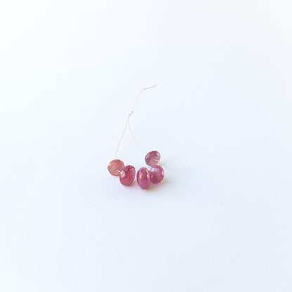 High‑quality Ruby stone beads arranged neatly for handmade jewellery components and beadwork.