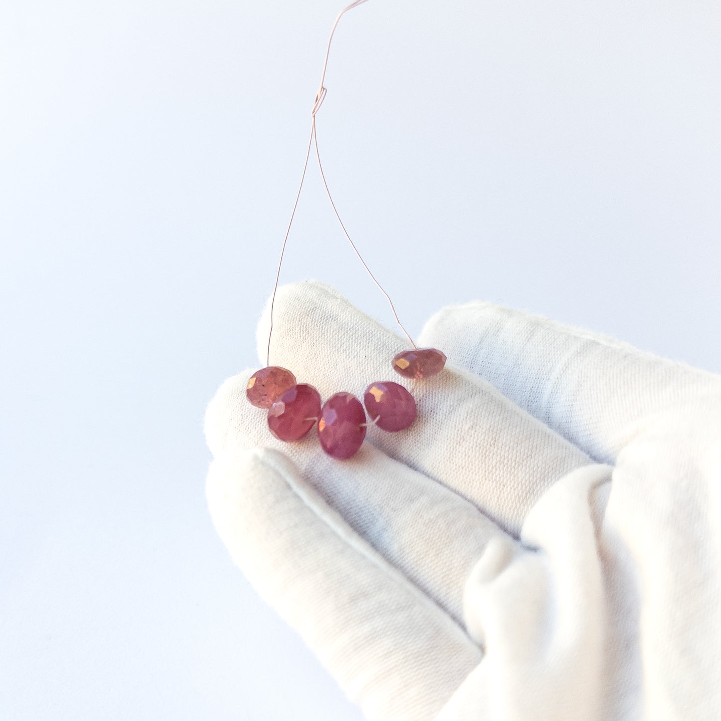 Ruby gemstone beads offering vivid colour and faceted shine for creative jewellery designs.