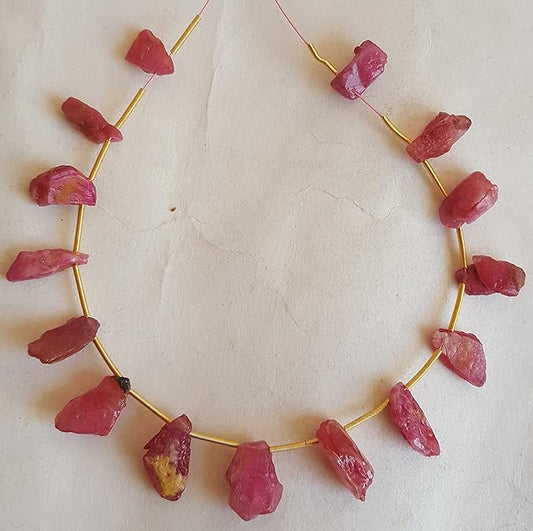 Elegant strand of rough natural ruby gemstone, beads sized 6mm to 7mm, highlighting their natural beauty and vibrant colour.