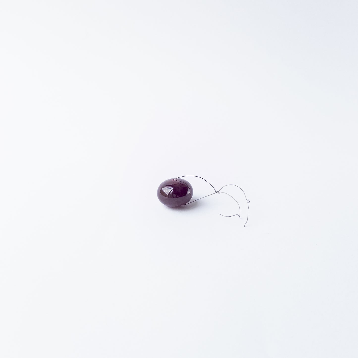 Ruby smooth rondelle gemstone bead with deep red colour and polished shine, ideal for jewellery accents.