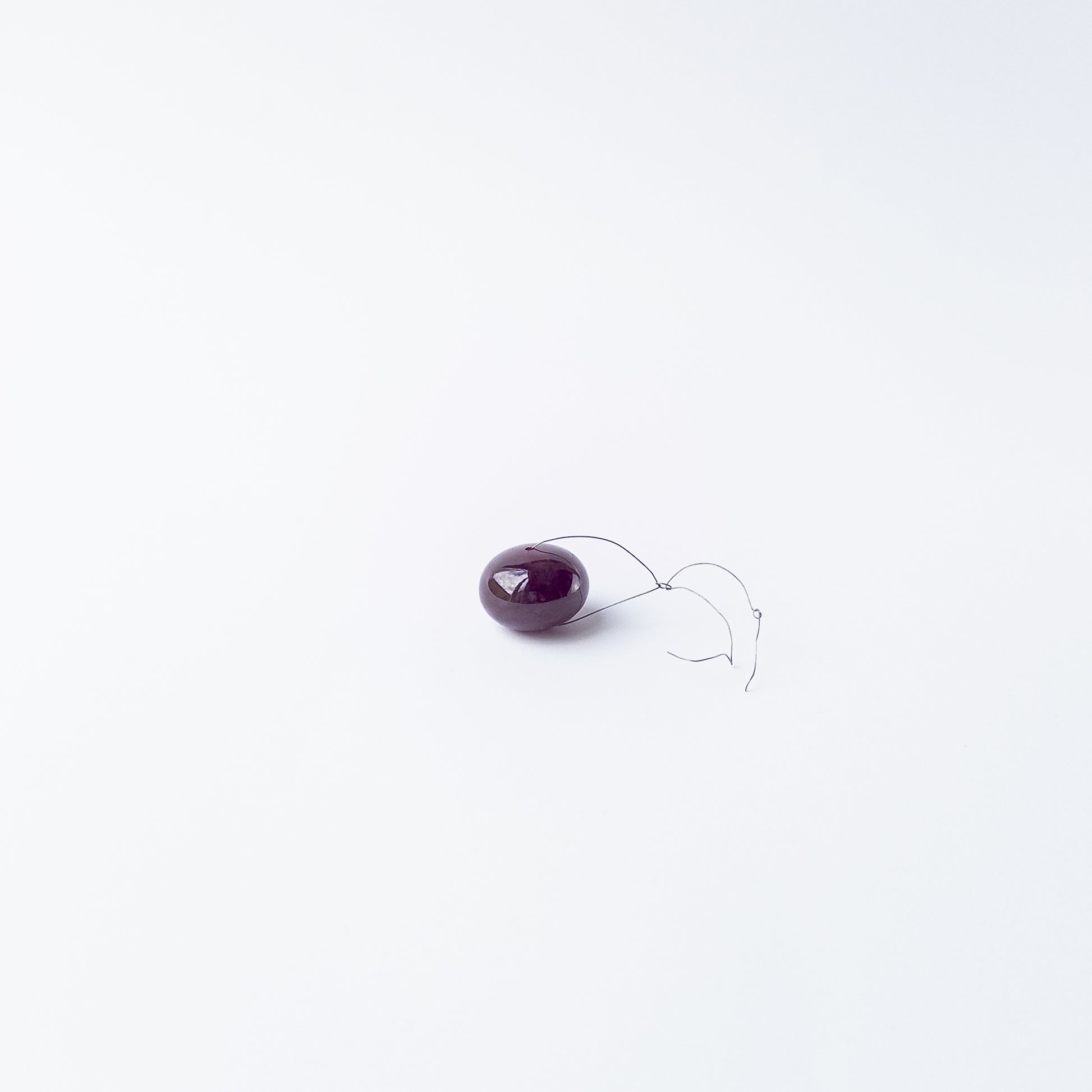 Ruby smooth rondelle gemstone bead with deep red colour and polished shine, ideal for jewellery accents.