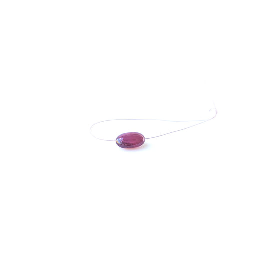 Ruby smooth tumble gemstone bead with deep red colour and polished shine, ideal for jewellery accents.
