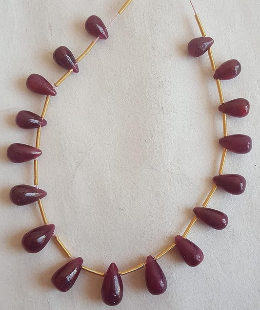 A strand crafted from natural ruby gemstone beads, radiating warmth and elegance.
