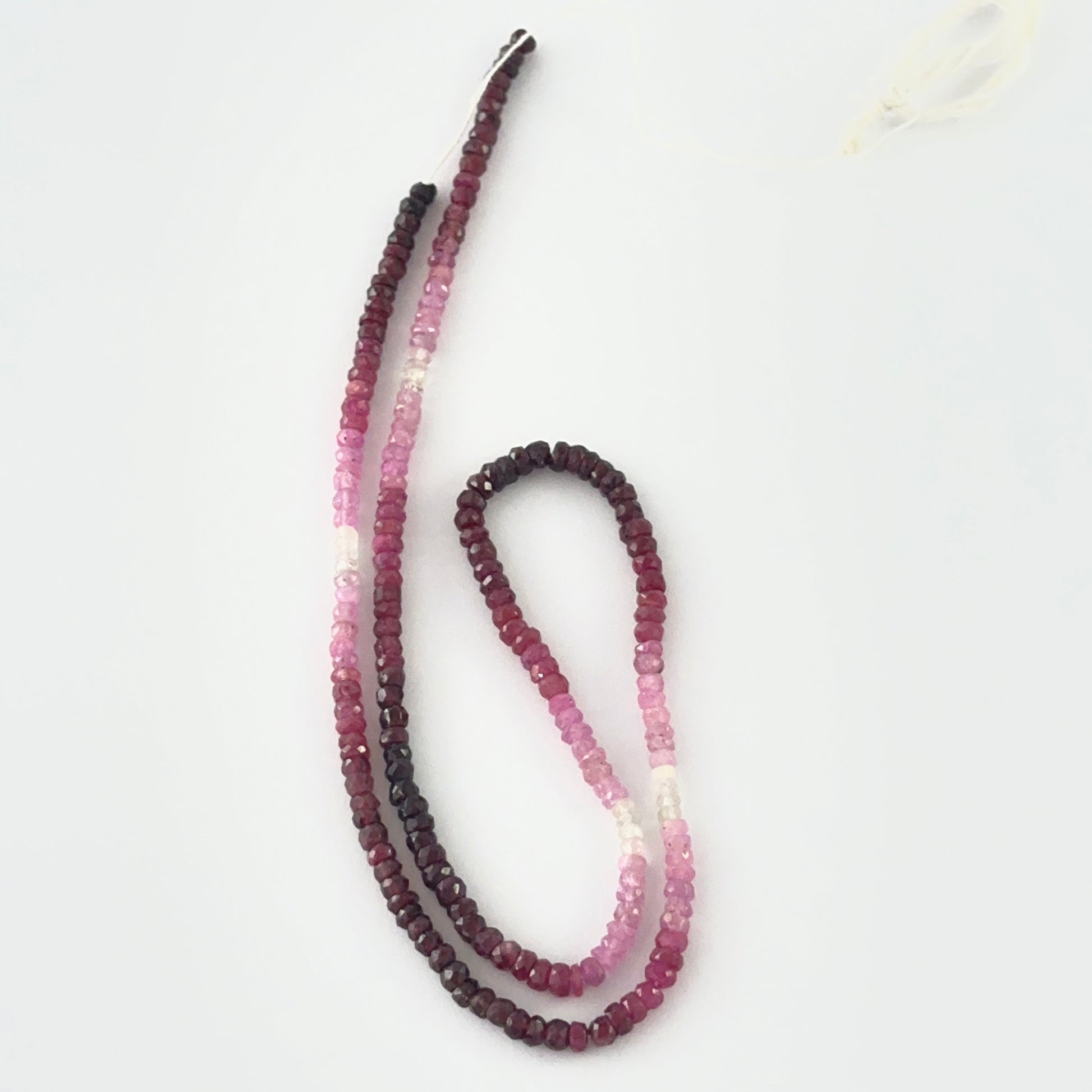 Shaded Ruby beads and handcrafted jewellery design in progress – Melbourne Gemstone Beads