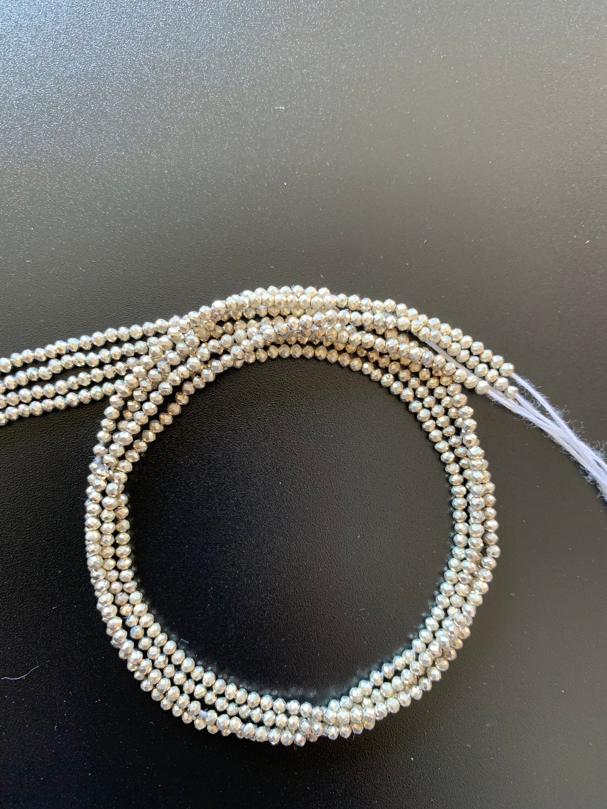 A striking strand of natural sliver pyrite beads, with 2.1mm faceted rondelles, perfect for adding colour to creations.
