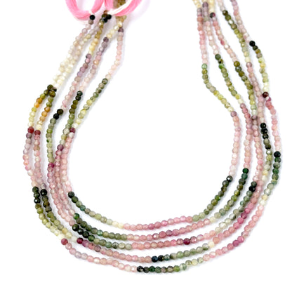 Natural Tourmaline faceted rondelle beads showing mixed colours and crisp gemstone cuts.