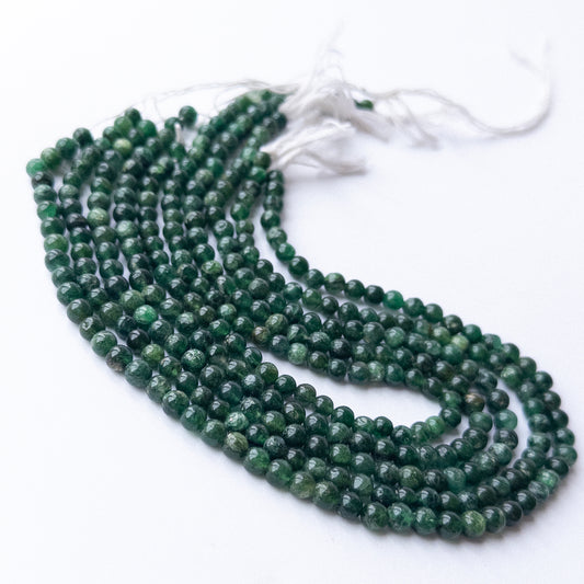 Aventurine smooth round beads in 5.7–5.9mm, showing soft green tones for handmade jewellery components.