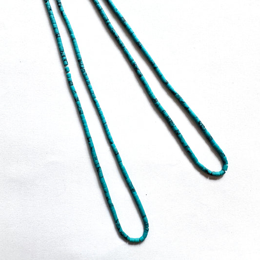 Afghan Heishi tube beads with 2–2.2mm size and smooth cylindrical cut on a 31cm strand.