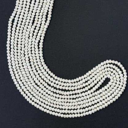 Pearl beads for DIY jewellery featuring polished rondelles with even sizing and elegant shine.