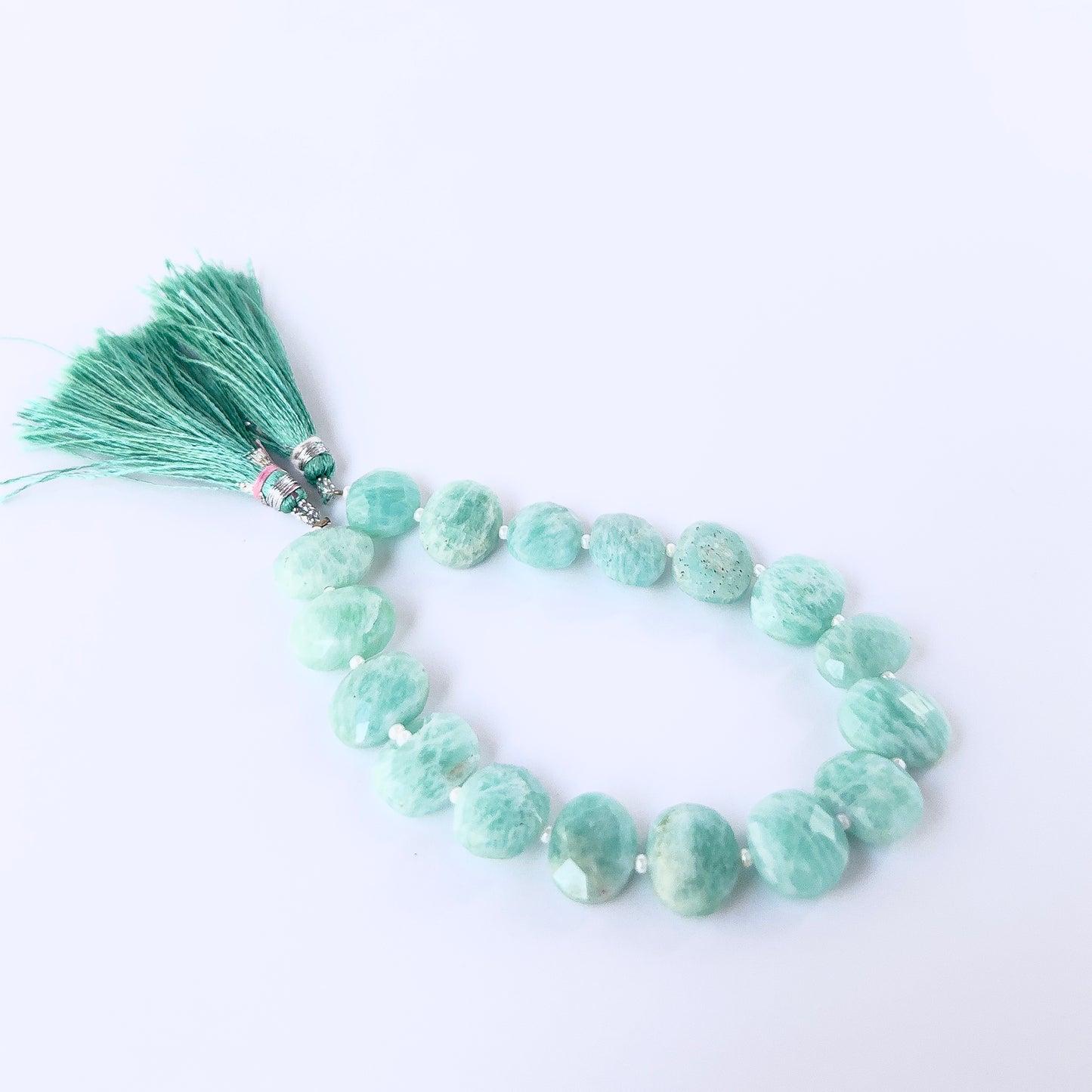 Premium Amazonite briolette beads showcasing sparkling facets and natural blue‑green colour.