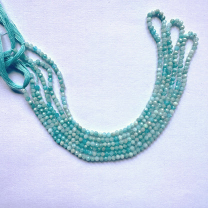 Delicate strands of Amazonite beads showcasing their Rondelle design.