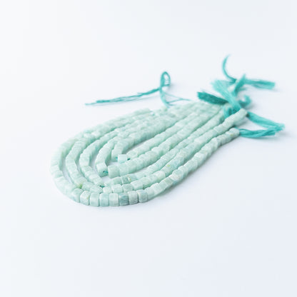 Genuine Amazonite gemstone beads with smooth cube cut, perfect for artisan jewellery designs.