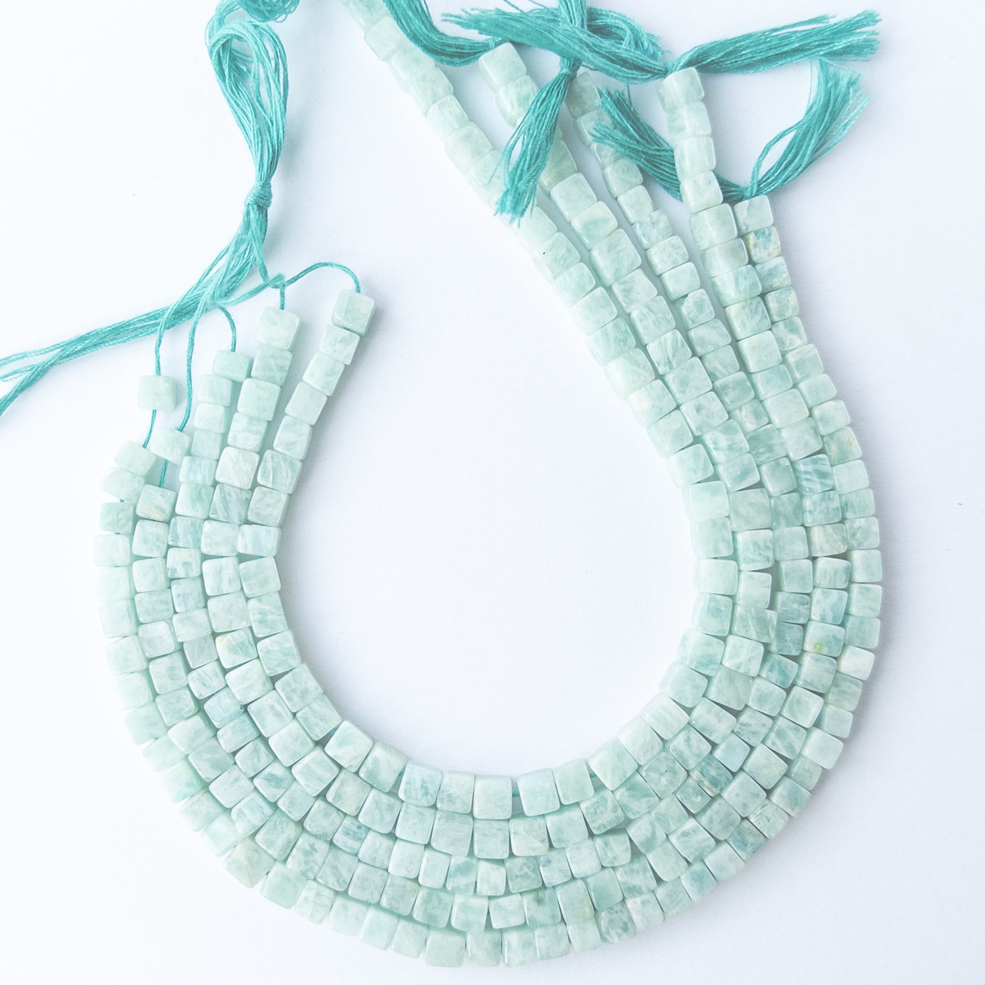 Amazonite smooth cube beads displaying natural colour variation and premium craftsmanship.