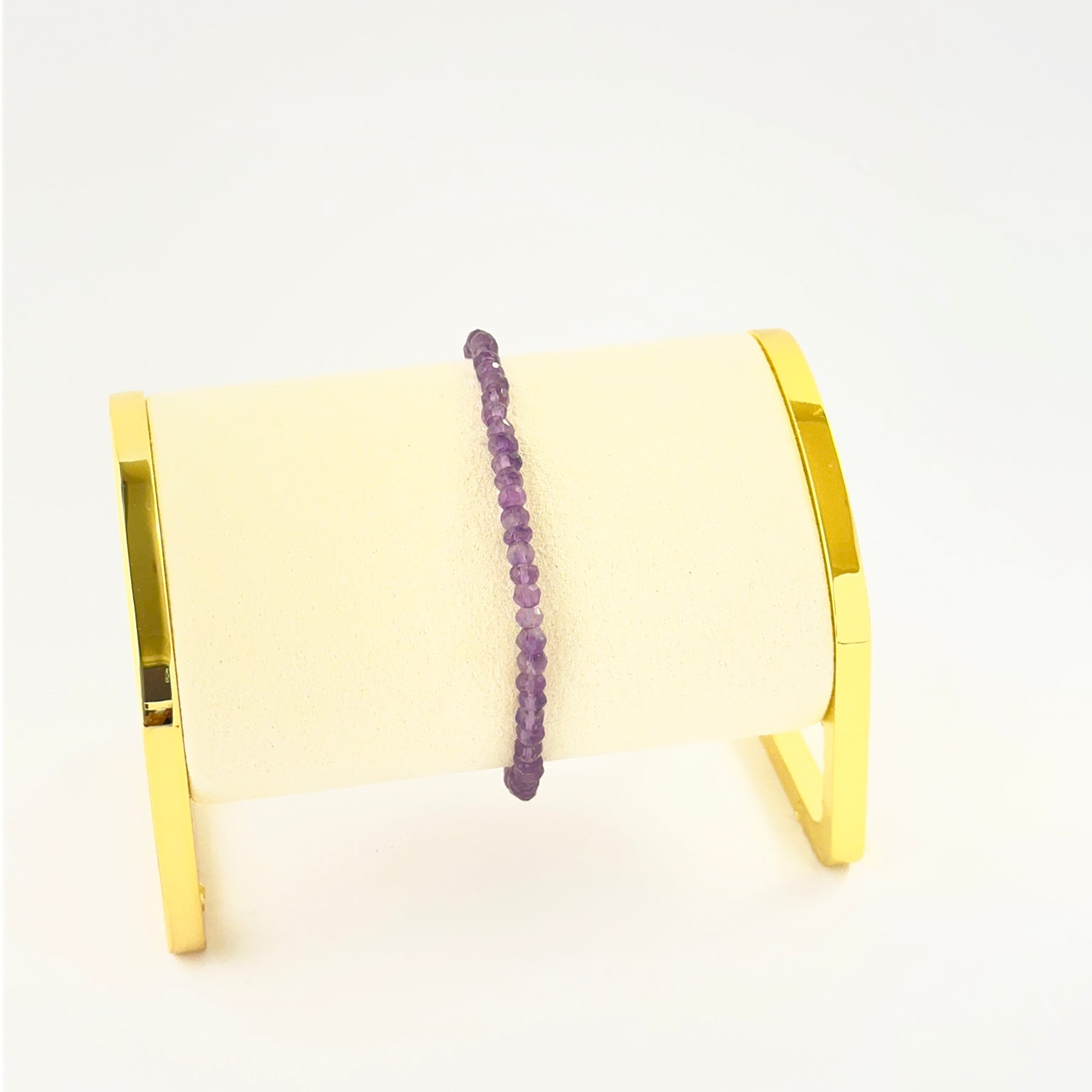 Amethyst bracelet featuring faceted rondelle 3.7–4mm beads in an 18cm adjustable design.