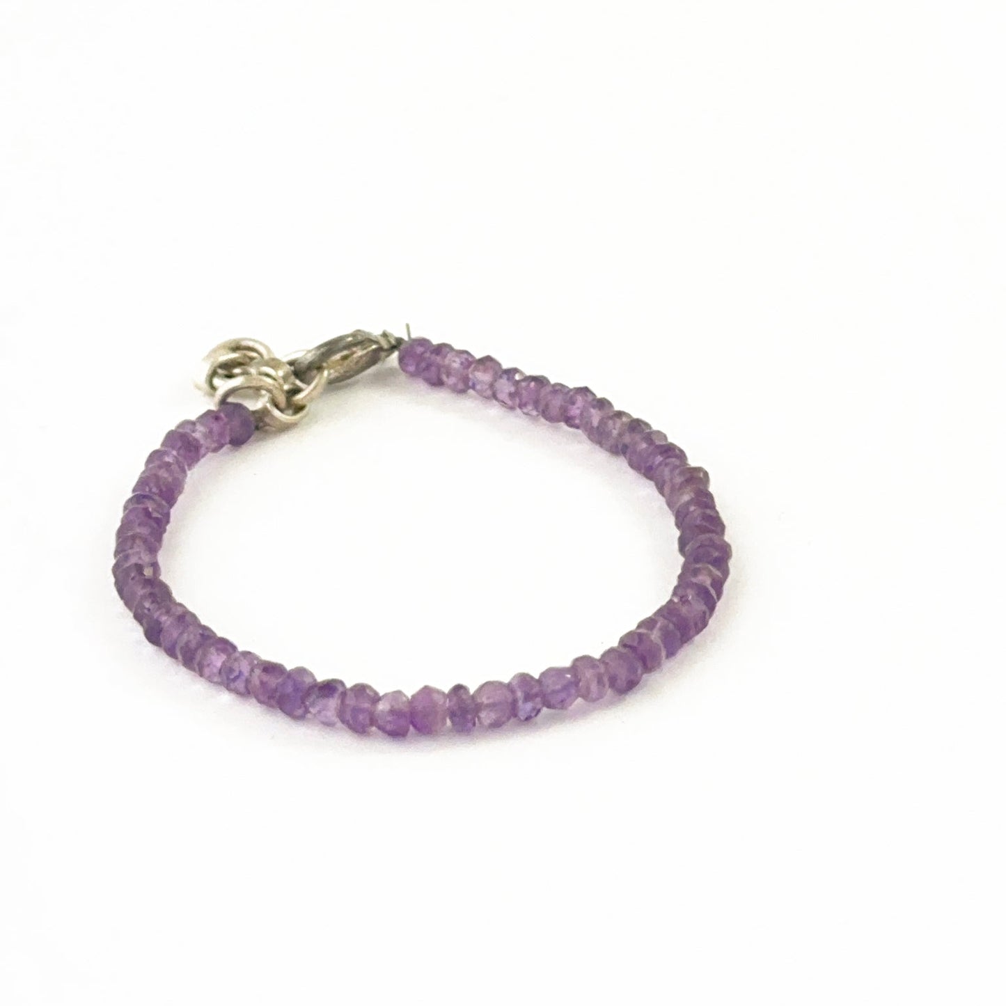 Sparkling amethyst bracelet showcasing faceted 3.7–4mm rondelle beads.
