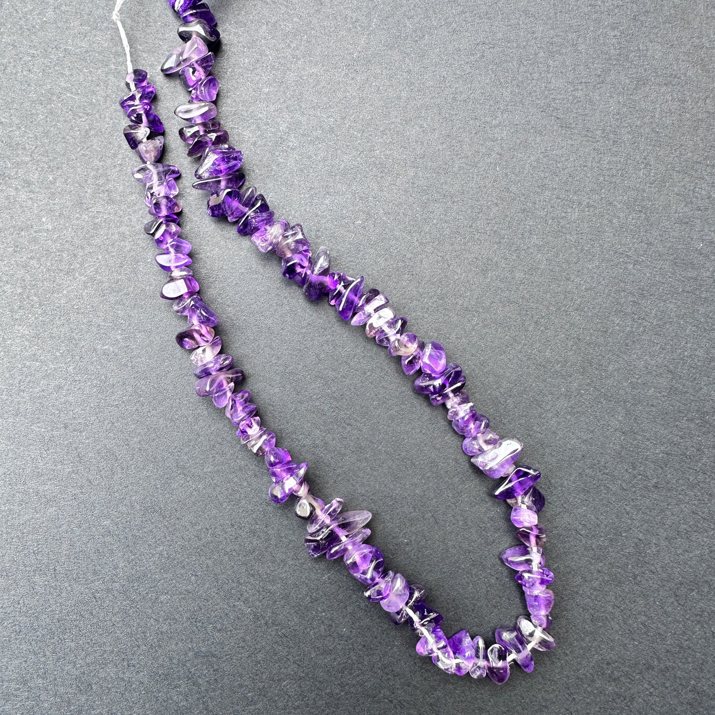 Natural gemstone beads in Amethyst, 5.0-7mm size, ideal for bohemian DIY jewellery designs.