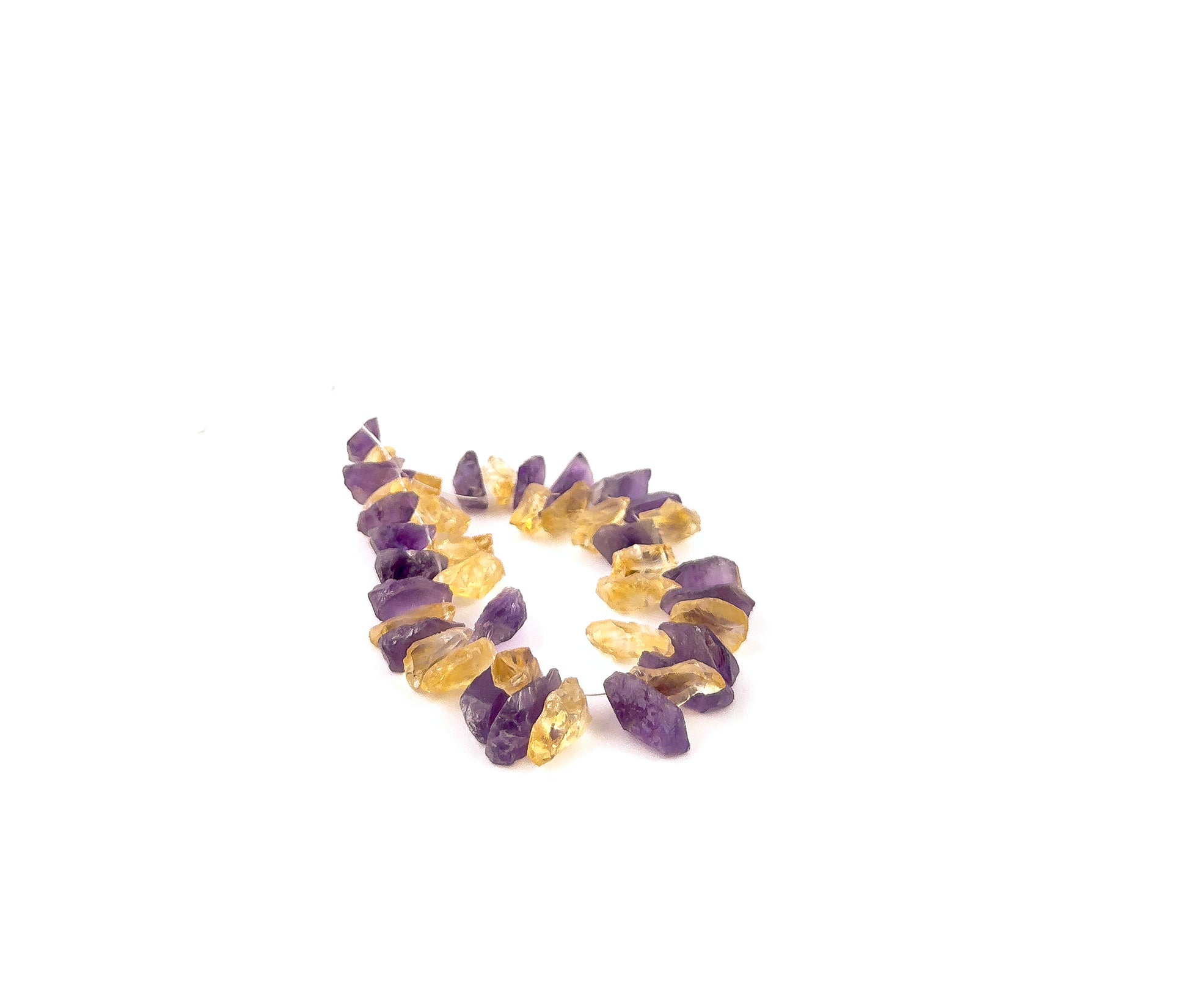 Natural Amethyst and Citrine drilled rough beads featuring raw crystal edges and bright colour contrast in a 172‑carat strand.