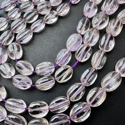 Handcrafted amethyst beads with polished finish and 0.5mm holes for DIY jewellery making.