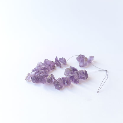 Genuine Amethyst stone beads in rough drilled form with natural sparkle, ideal for DIY jewellery makers.