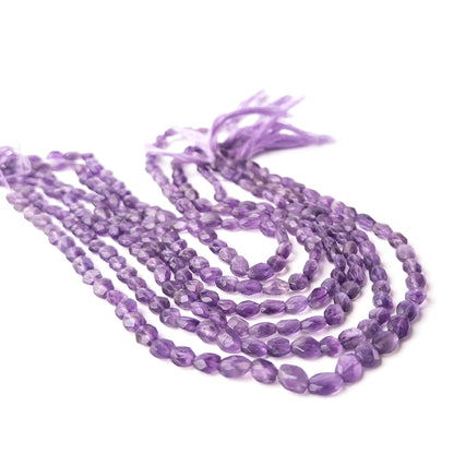 Genuine Amethyst stone beads with sparkling faceted rondelle cut, arranged on a 33cm strand for DIY jewellery making.