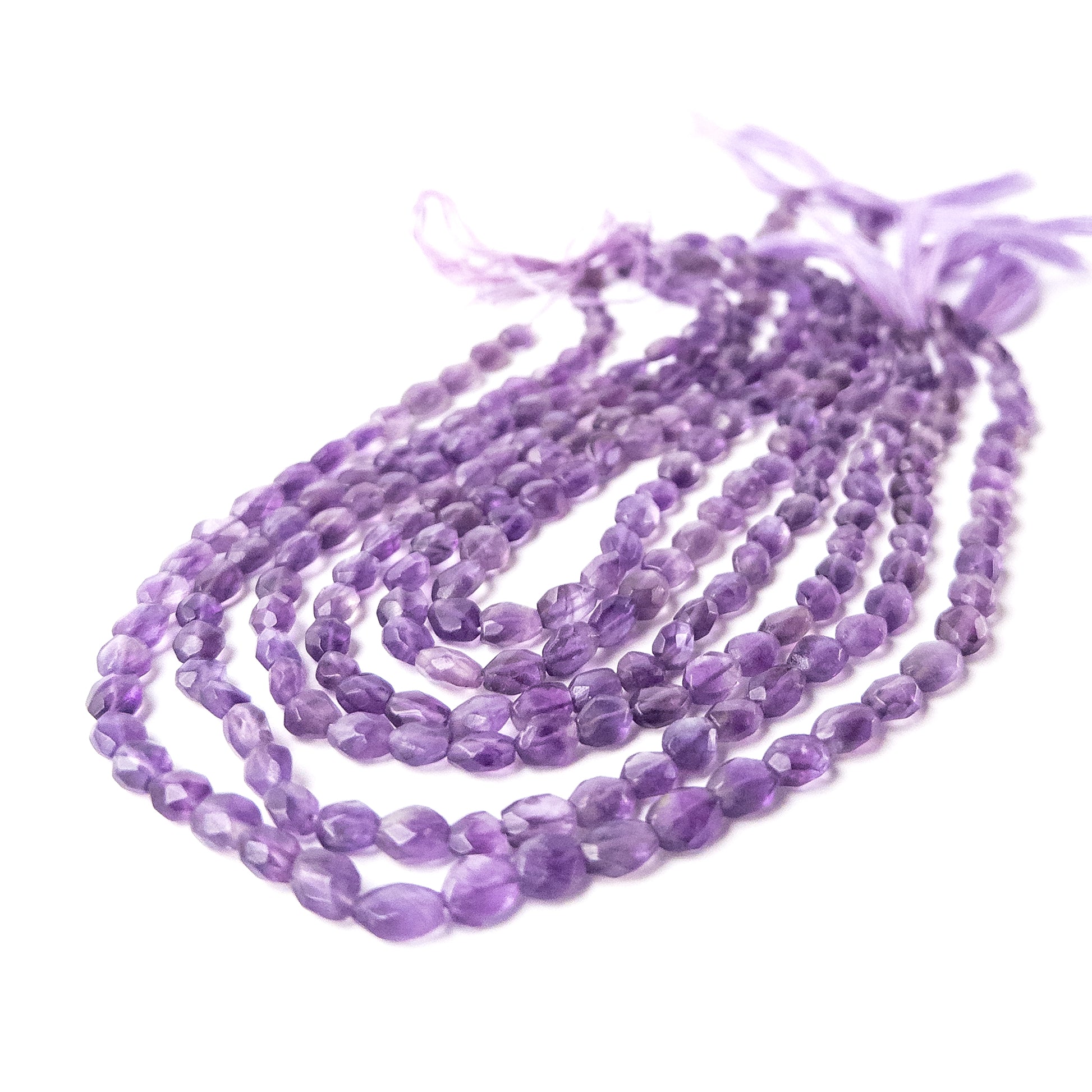 Authentic Amethyst gemstone beads showcasing vibrant colour and shine, perfect for premium jewellery design projects.
