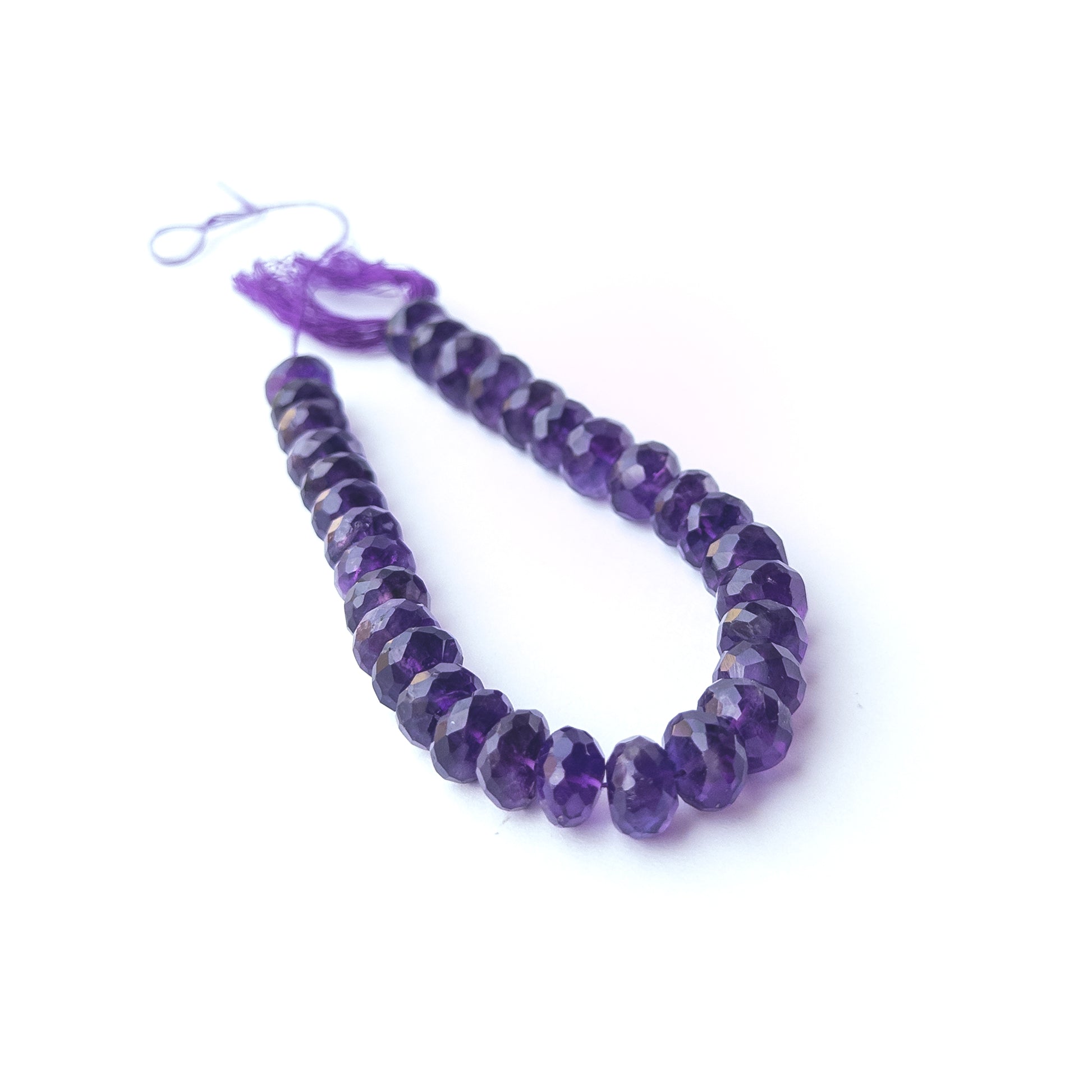 Vibrant Amethyst gemstone beads with 10.2–11mm faceted rondelle cut for DIY jewellery designers.