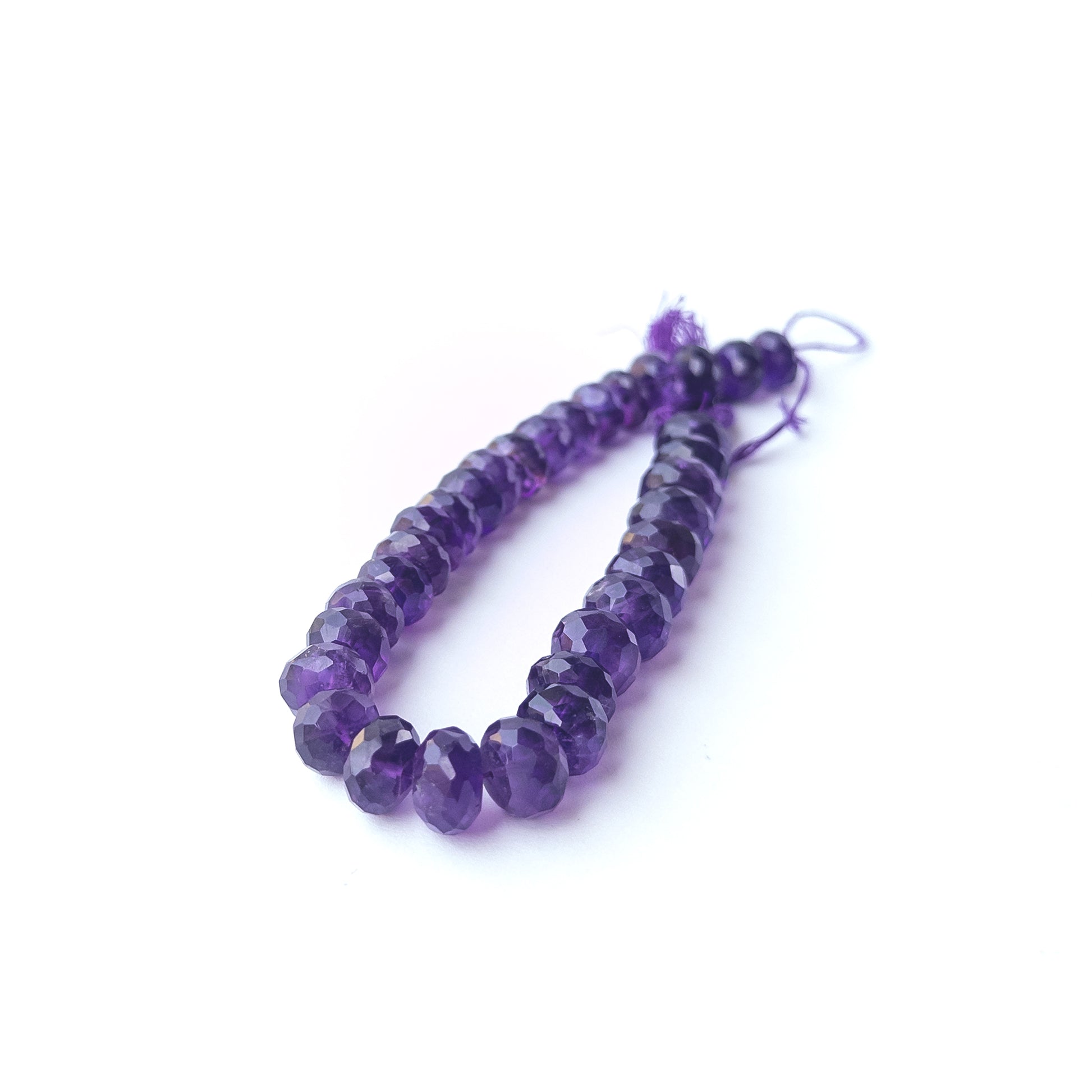 Handmade jewellery components crafted from genuine Amethyst faceted rondelle beads with radiant sparkle.