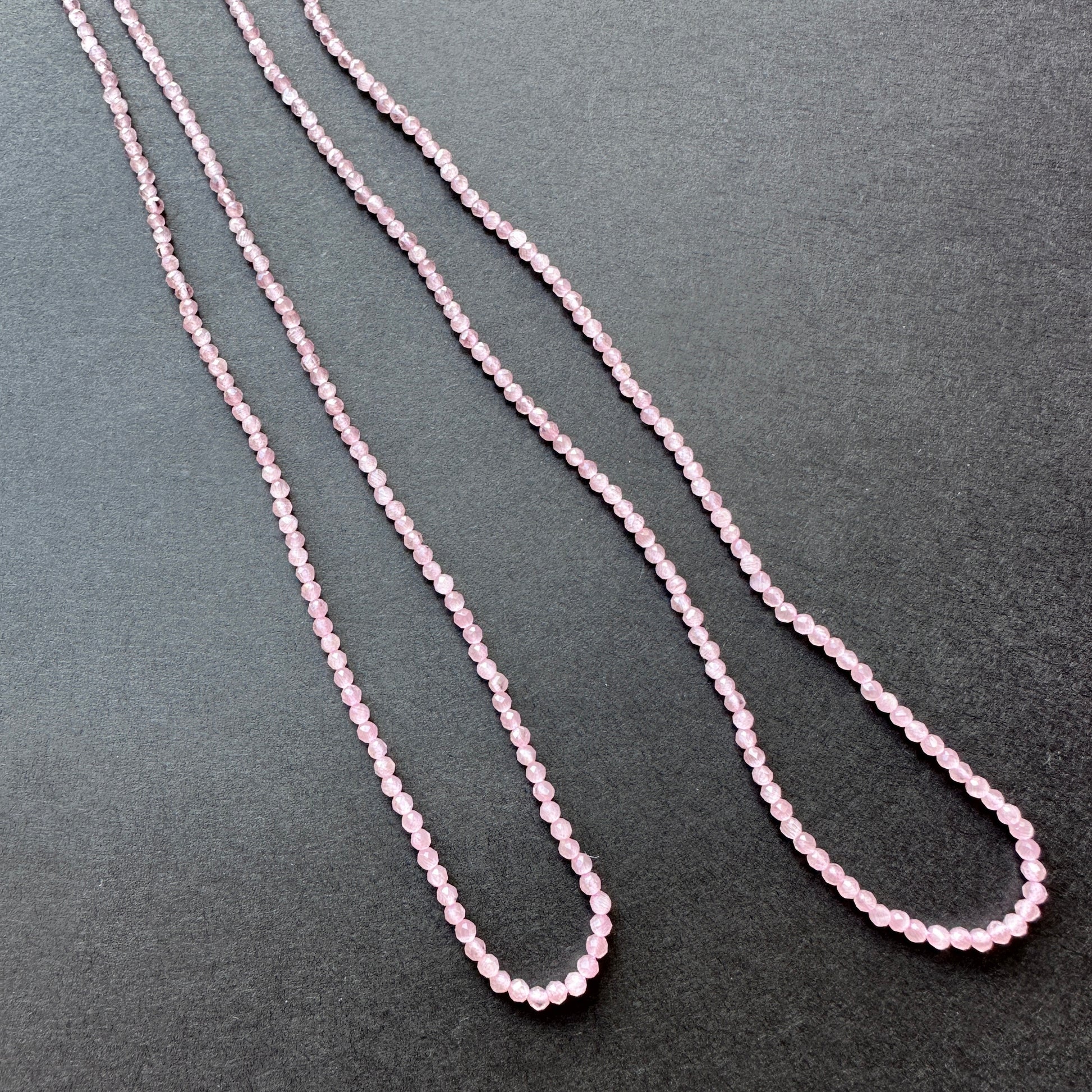 Gemstone Stone beads in rich pink violet tones with precision-cut facets, ideal for DIY jewellery and layering designs.