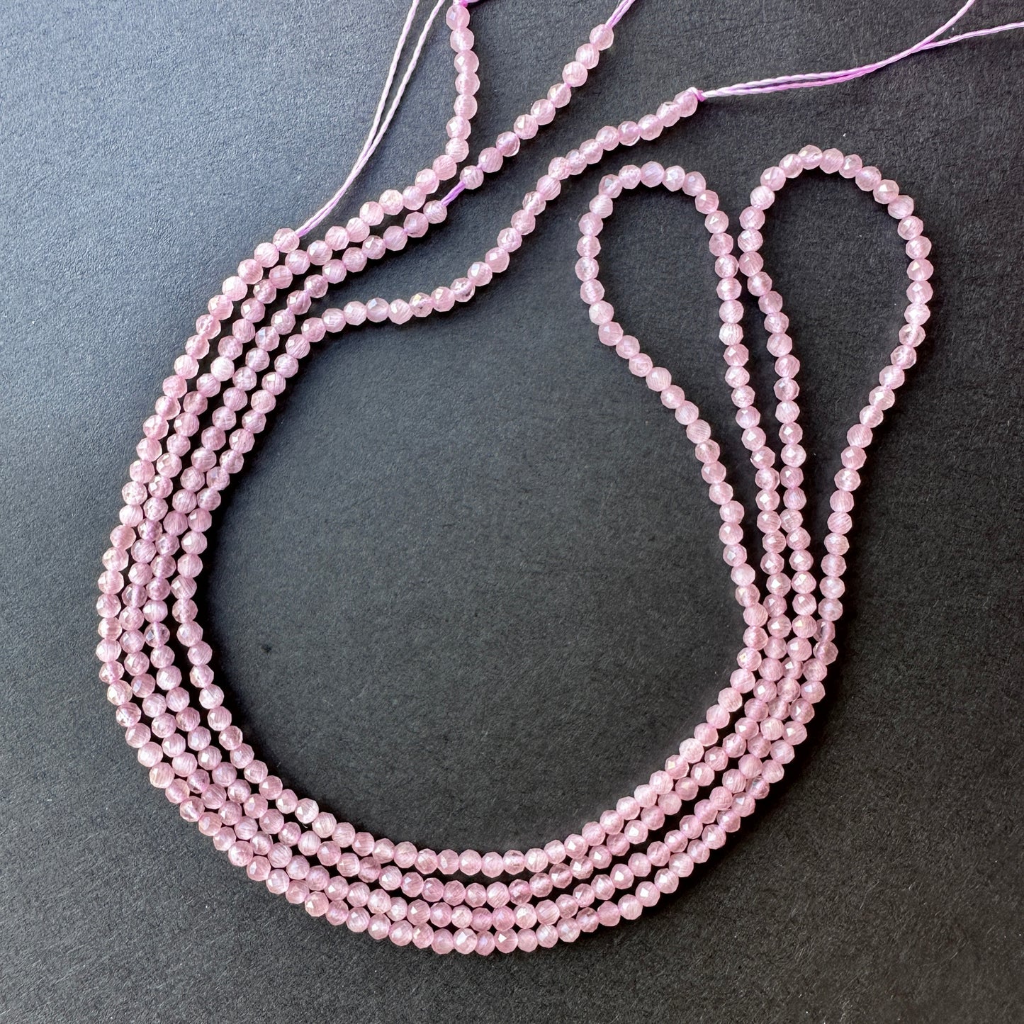 Handmade jewellery components featuring faceted amethyst rondelle beads on a 38cm strand.