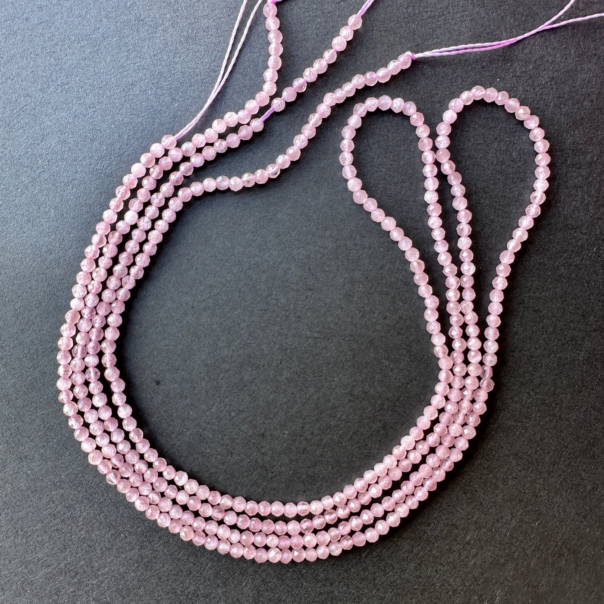 Handmade jewellery components featuring faceted amethyst rondelle beads on a 38cm strand.