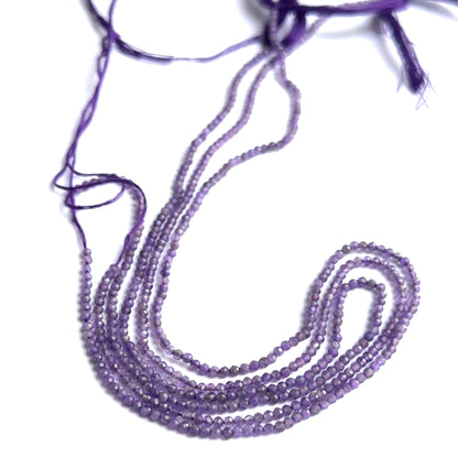Amethyst faceted rondelle beads showing bright sparkle and rich purple colour for handmade jewellery.