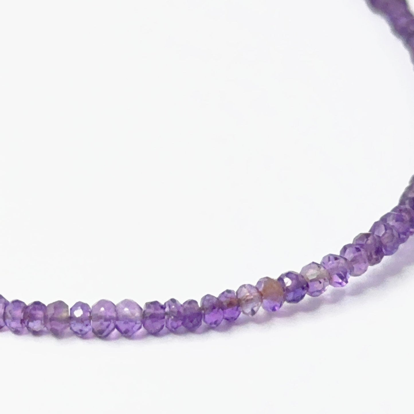 Sparkling Amethyst rondelle‑cut beads with bright shine, perfect for genuine gemstone beads in creative designs.
