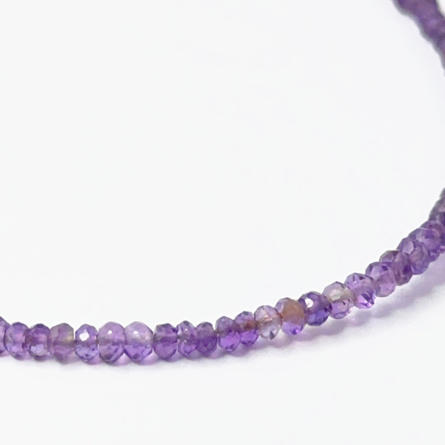 Sparkling Amethyst rondelle‑cut beads with bright shine, perfect for genuine gemstone beads in creative designs.