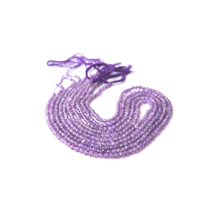 Strands of Amethyst faceted rondelle gemstone beads arranged neatly, showcasing their fine cut and vibrant colour.