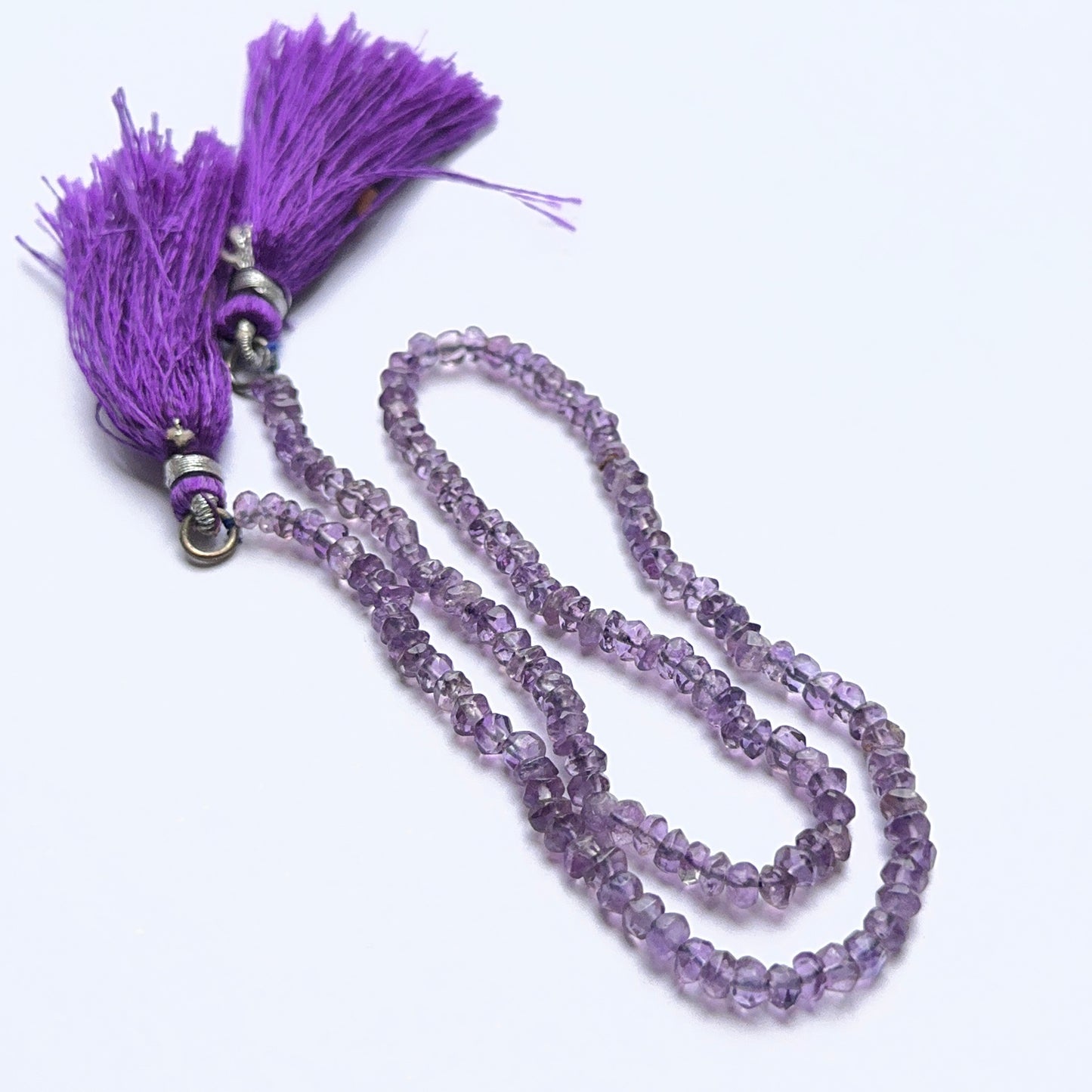 Amethyst faceted rondelle natural gemstone beads in 3.8–4mm on a 34cm strand, showing bright purple sparkle for DIY jewellery.