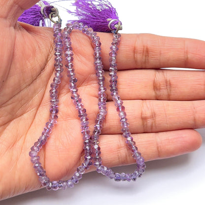 Amethyst natural gemstone beads in faceted rondelle shape, ideal for artisan jewellery and creative DIY beadwork.