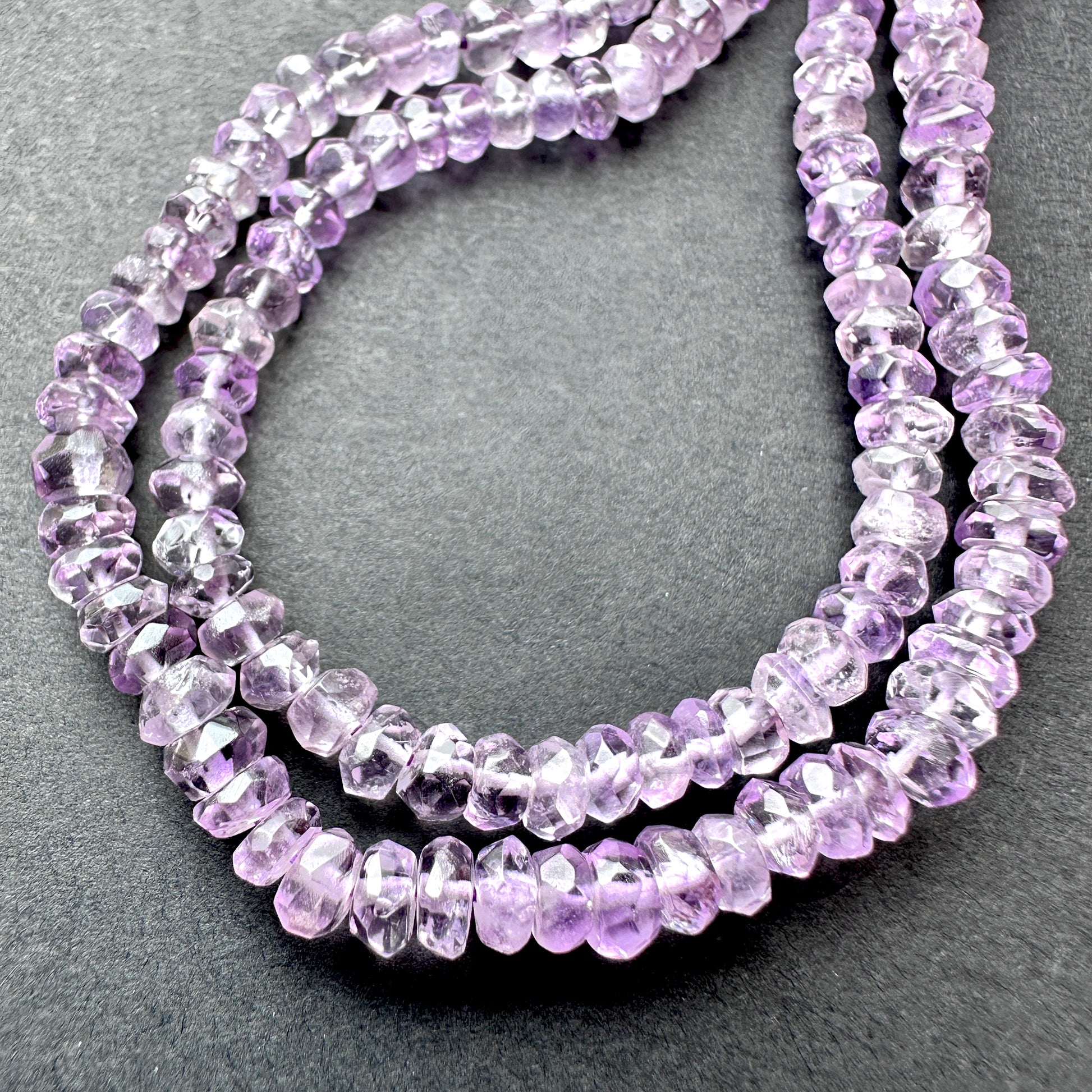 Natural gemstone beads in Amethyst, 3.8-4mm size, ideal for elegant DIY jewellery designs.