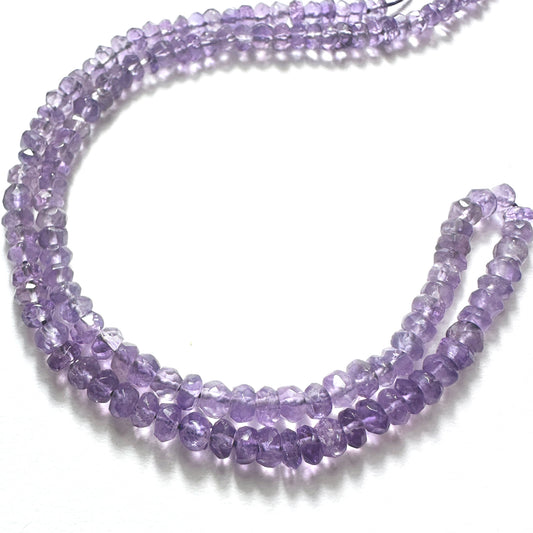 Amethyst rondelle beads with rich purple colour and faceted shine on a 36cm strand of natural gemstone beads.