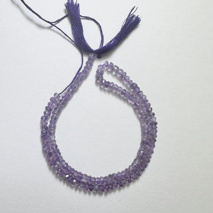 Handmade jewellery components with 4.1mm Amethyst beads arranged in a neat strand, ideal for elegant designs.