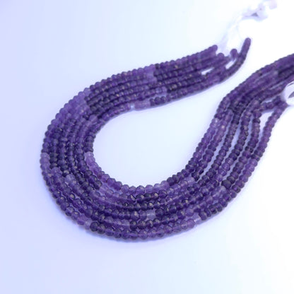 Handmade jewellery components featuring Amethyst faceted rondelle beads.