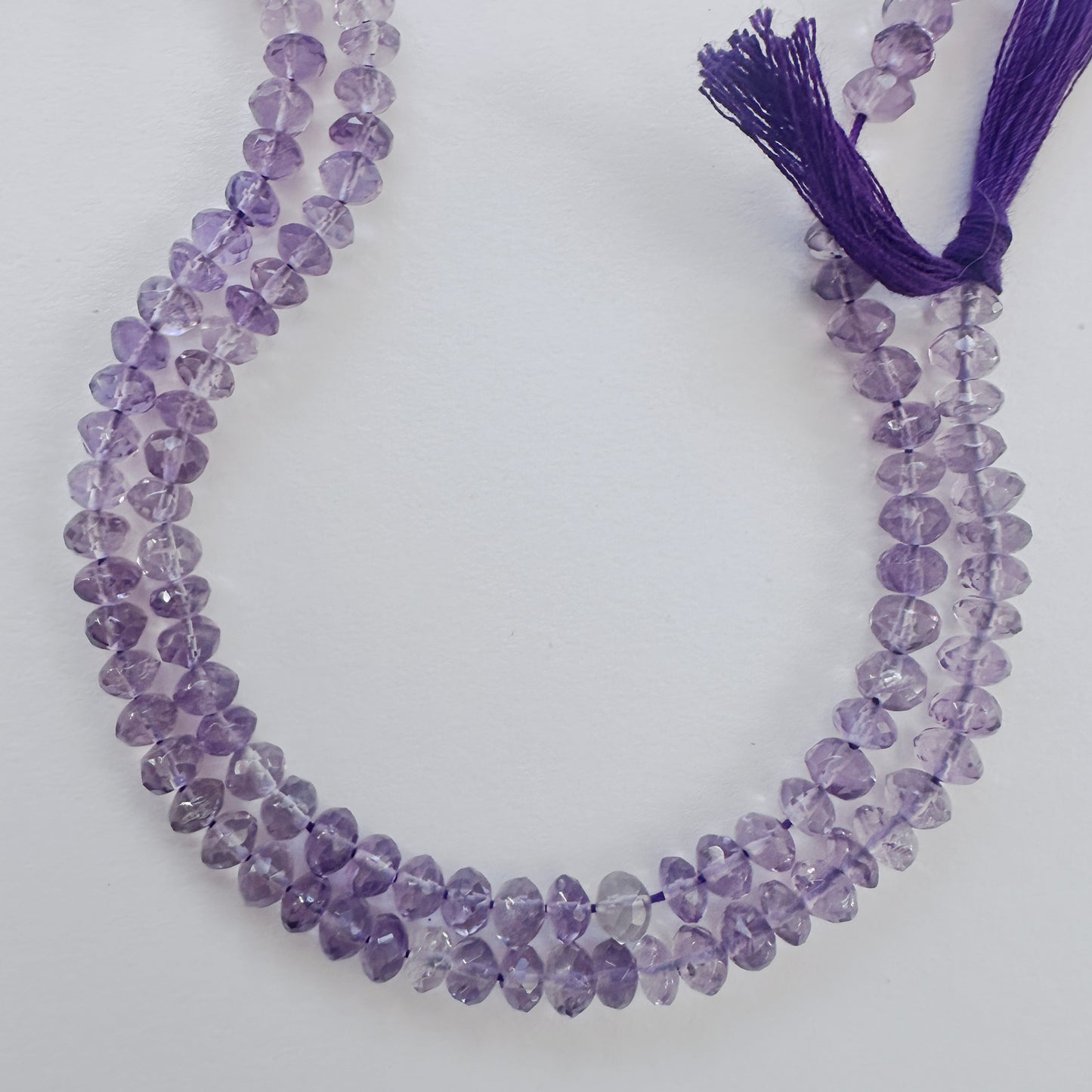 Handmade jewellery components featuring 5-5.2mm Amethyst stone beads.